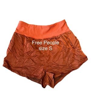 Free people orange athletic shorts